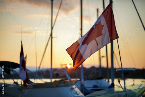 Canadian flag at sunset © Brandon