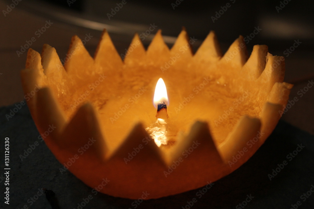 Fototapeta premium Orange peel candle with oil