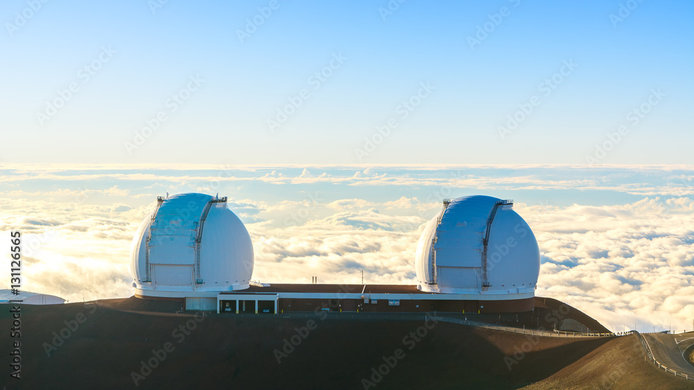 Telescopes on top of Mauna Kea Mountain at sunset, Big Island, Hawaii