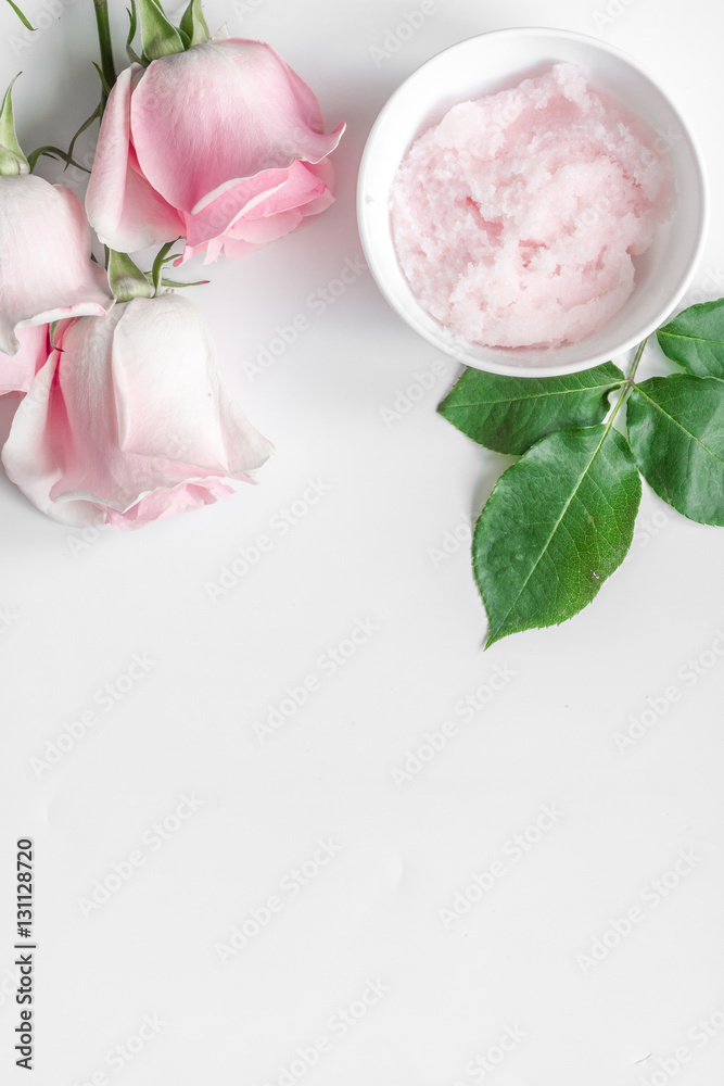 organic cosmetic with rose oil on white background top view organic cosmetic with rose oil on white background top view