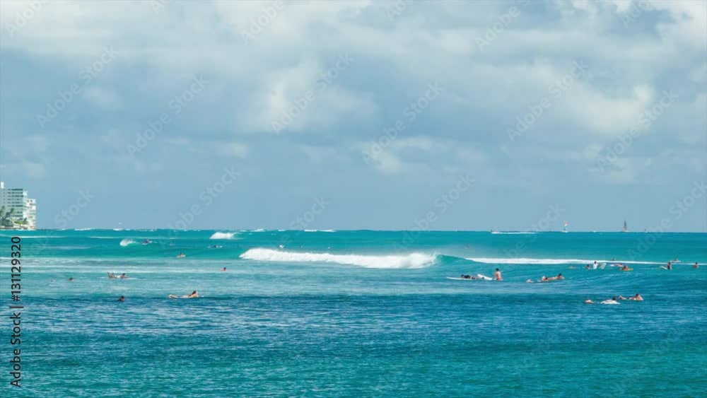 Honolulu Hawaii Surfers Paradise at Waikiki Beach with Experienced and New Surfers Learning the Popular Recreational Activity