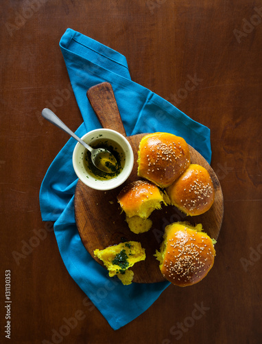 homemade scones buns with turmeric and sesame seeds photo