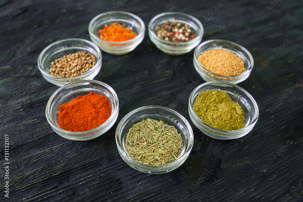 Various spices and herbs on white background. Various spices and herbs on white background.