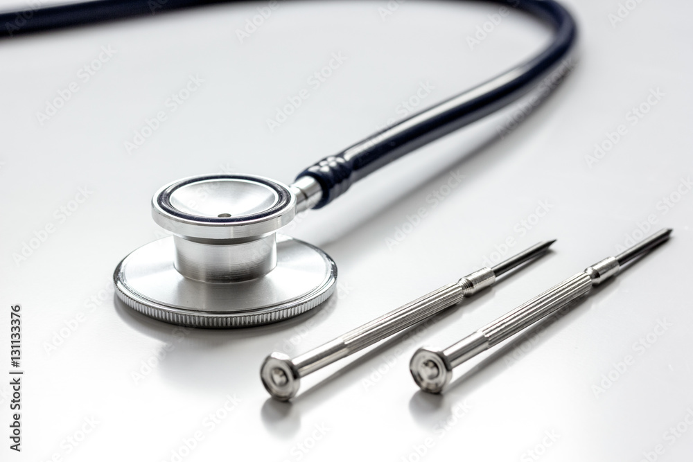 diagnostic of gadgets on white background with stethoscope diagnostic of gadgets on white background with stethoscope