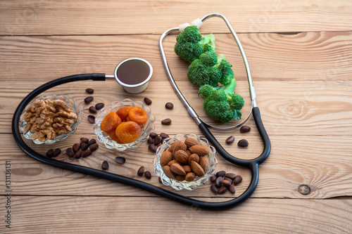 Healthy food in heart and healthy heart concept on boards