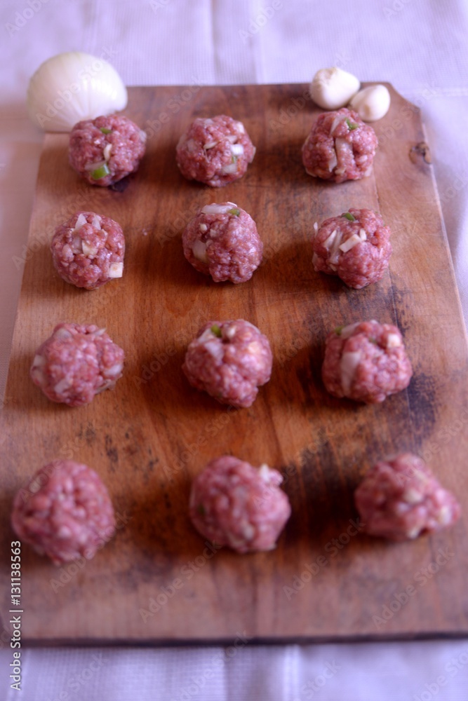 Meatballs waiting to go in the oven Meatballs waiting to go in the oven