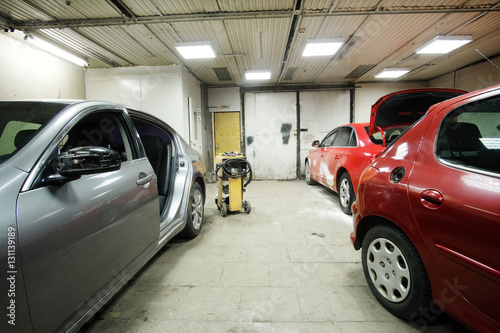 Crashed cars in a car repair station