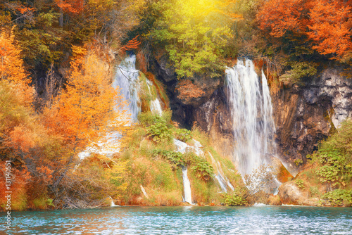 Beautiful waterfall in autumn forest