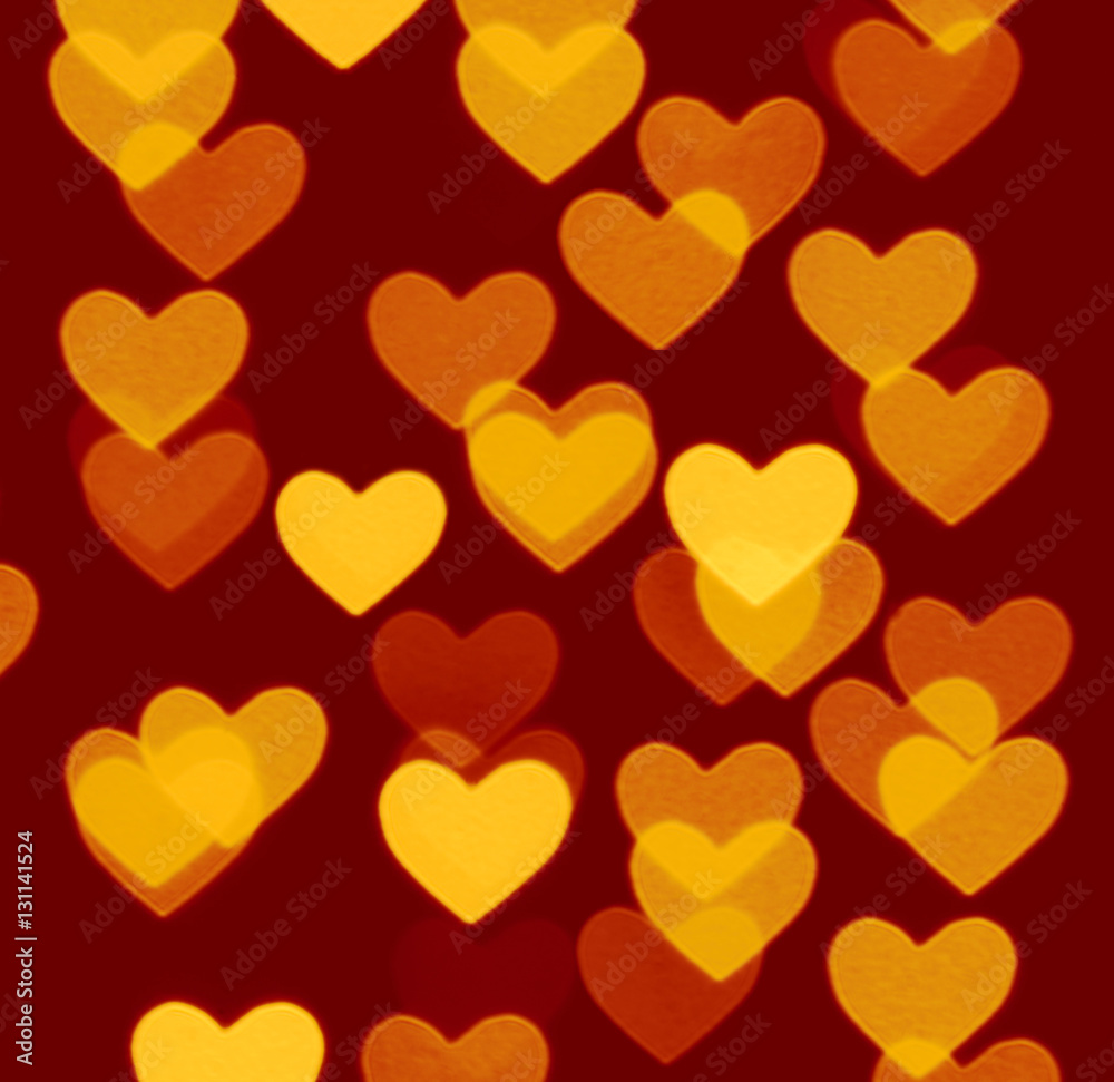 heart bokeh background, photo blurry objects, yellow on dark brown