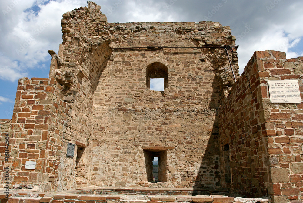 The fragment of the reconstructed stony tower in the medieval Genoese fortress Soldaia in Sudak, Crimea.  