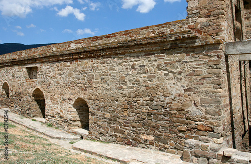 The fragment of the reconstructed stony wall in the medieval Genoese fortress Soldaia in Sudak, Crimea.