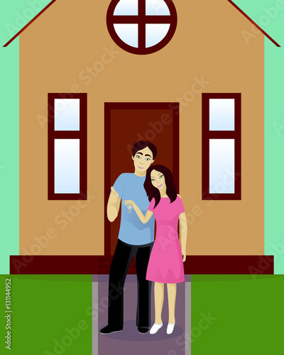 Happy couple with house keys