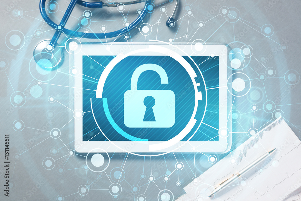 Top view of doctor workplace with tablet pc and medicine tools on wooden table