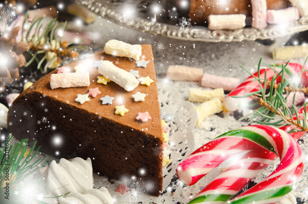 Traditional Homemade chocolate Christmas cake with sugar stars and marshmallow, new year decoration Traditional Homemade chocolate Christmas cake with sugar stars and marshmallow, new year decoration