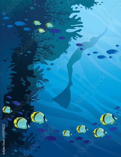 Silhouette of freediver, coral reef and butterfly-fish. Underwat