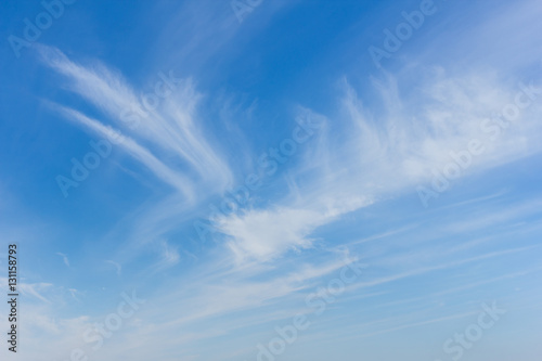 blue sky with tiny clouds