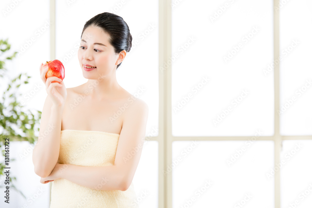 beautiful skin asian woman towel wrap holding fresh apple beautiful skin asian woman towel wrap holding fresh apple