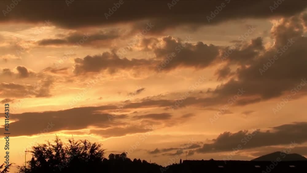 Time lapse fiery sunset over the city during spring season. Landscape at Bergamo, one of the beautiful city in Italy. Lombardy. Time lapse fiery sunset over the city during spring season. Landscape at Bergamo, one of the beautiful city in Italy. Lombardy.