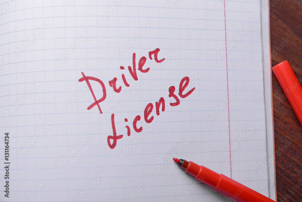 Notepad with text, close up. Driver license concept Notepad with text, close up. Driver license concept