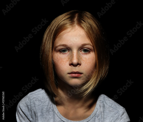 Portrait of sad little girl...