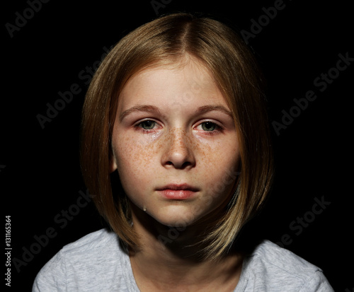 Portrait of sad little girl...