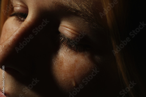 Closeup of crying girl face