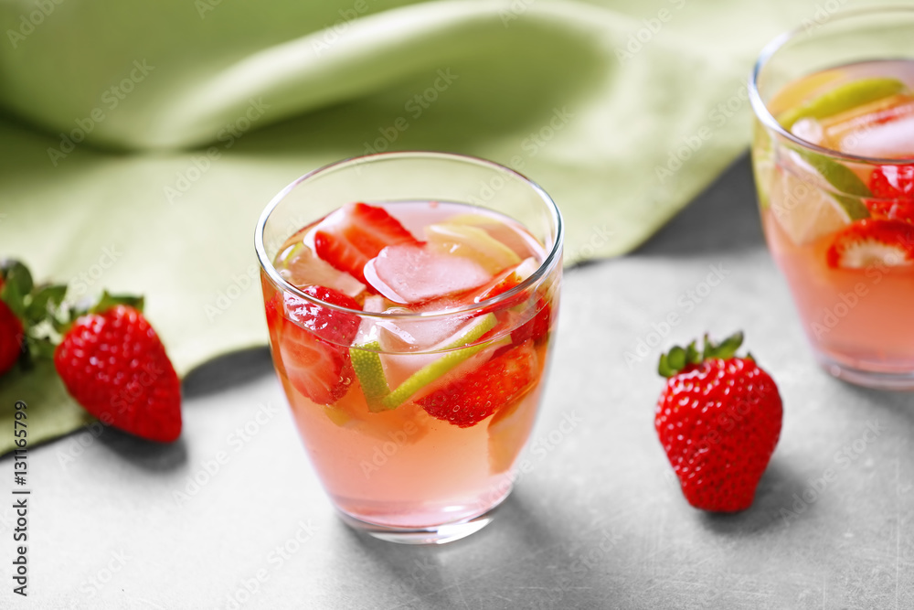 Two glasses of fresh strawberry cocktail on light background Two glasses of fresh strawberry cocktail on light background
