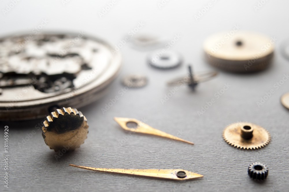 Detail of watch machinery on the table. Detail of watch machinery on the table.
