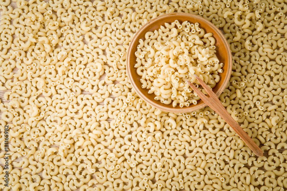 Macaroni pasta background. Healthy eating and lifestyle. Macaroni pasta background. Healthy eating and lifestyle.
