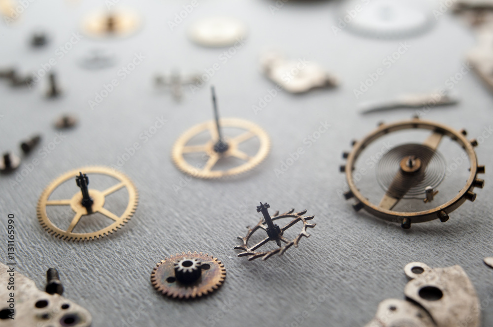 Detail of watch machinery on the table. Detail of watch machinery on the table.