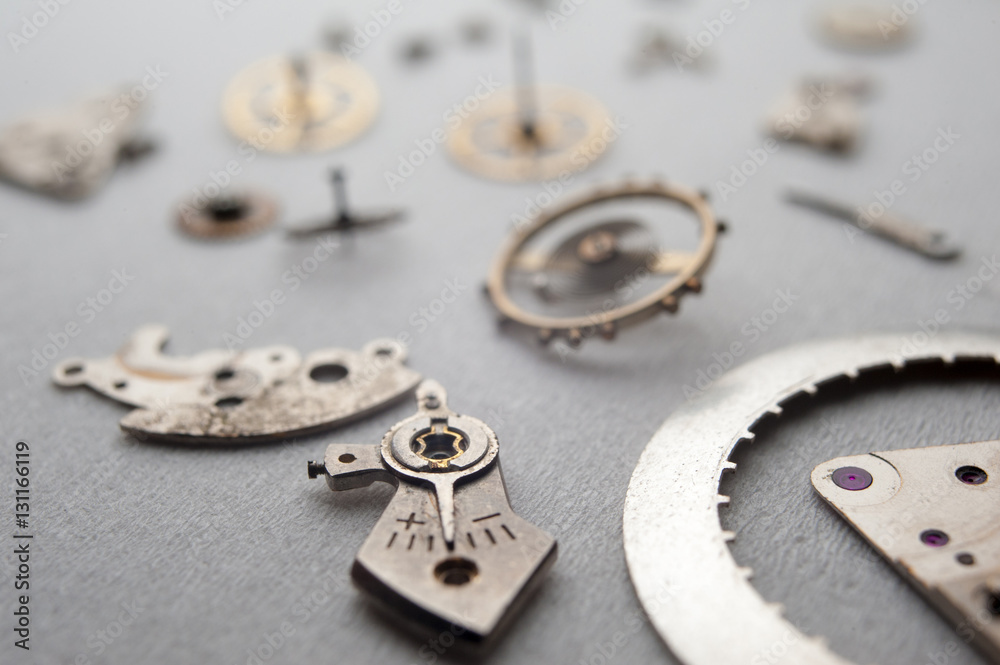 Detail of watch machinery on the table. Detail of watch machinery on the table.