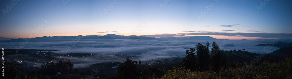 Panorama Sunrise and sea of clouds over Pai District Mae Hong Son, THAILAND. View from Yun Lai Viewpoint is located about 5 km to the West of Pai town centre above the Chinese Village.