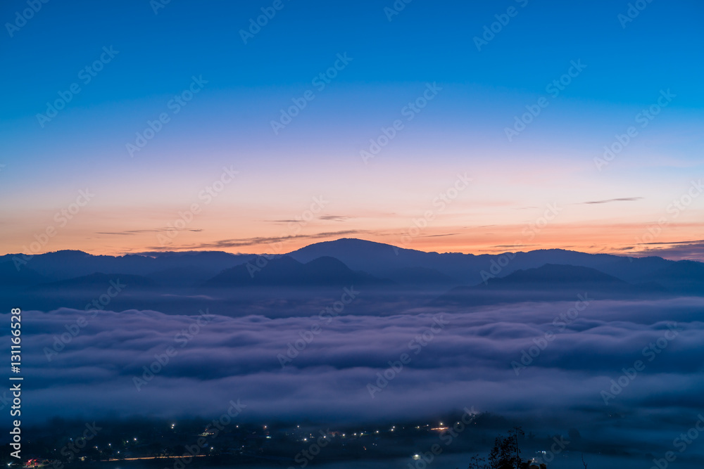 Obraz premium Sunrise and sea of clouds over Pai District Mae Hong Son, THAILAND. View from Yun Lai Viewpoint is located about 5 km to the West of Pai town centre above the Chinese Village.