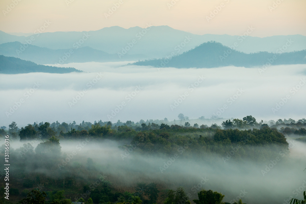 Sunrise and sea of clouds over Pai District Mae Hong Son, THAILAND. View from Yun Lai Viewpoint is located about 5 km to the West of Pai town centre above the Chinese Village.