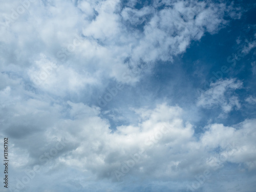 Background of the white cumulus in the sky. Picture of the white cloudy sky.