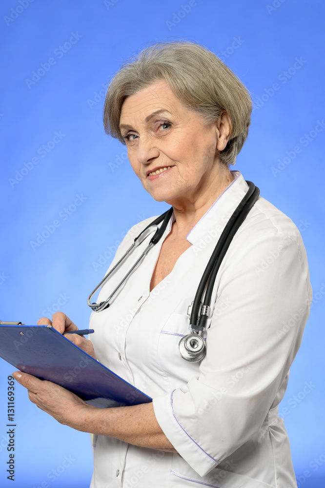 mature female doctor Stock Photo | Adobe Stock