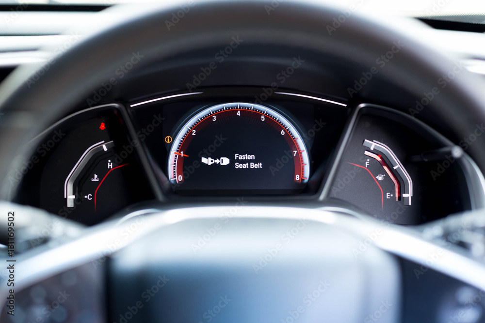 Fasten seat belt warning sign on car dashboard information for s