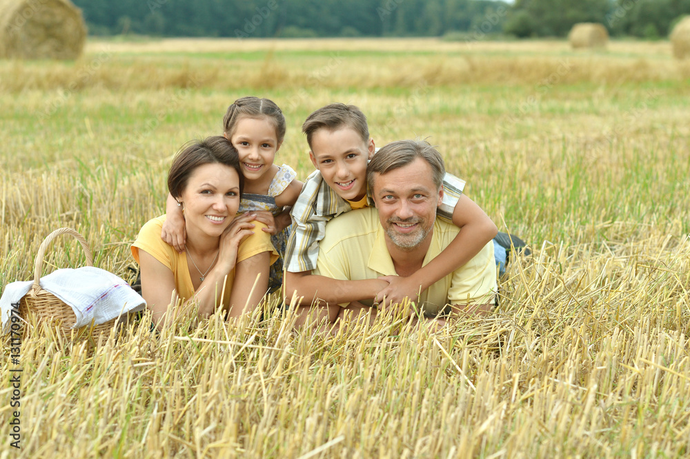 Fototapeta premium happy family at field