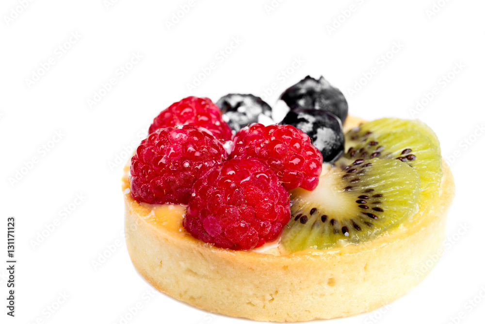 Homemade fruit tart with berries and kiwi isolated Homemade fruit tart with berries and kiwi isolated