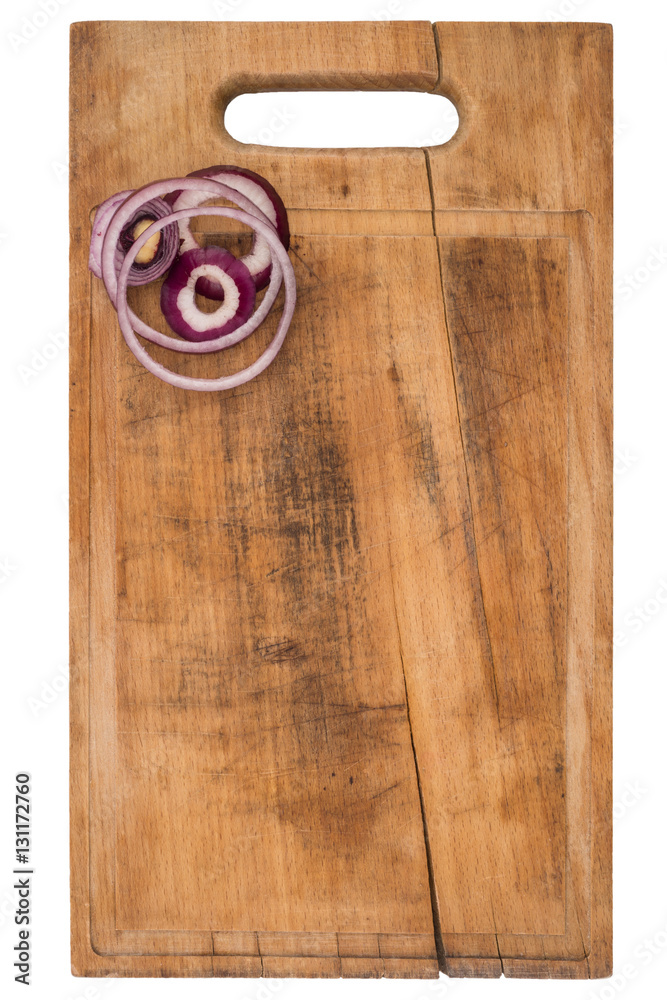 Fototapeta premium Sliced onion rings on a cutting board. Isolated on white.