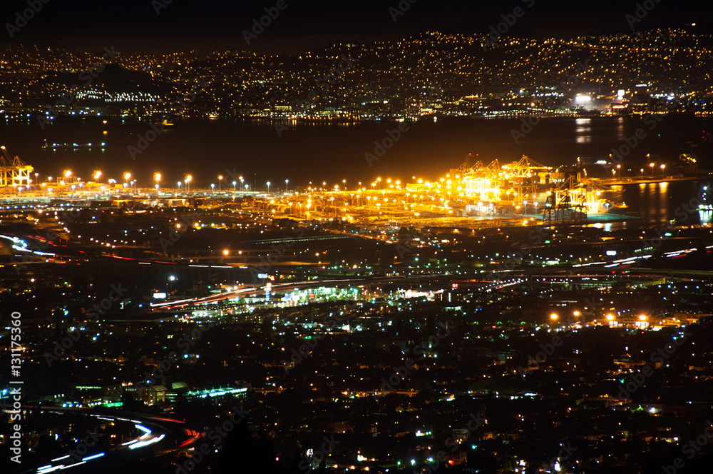 lights shining off the San Francisco bay at night.