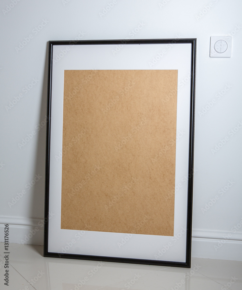 Fototapeta premium black picture frame on floor