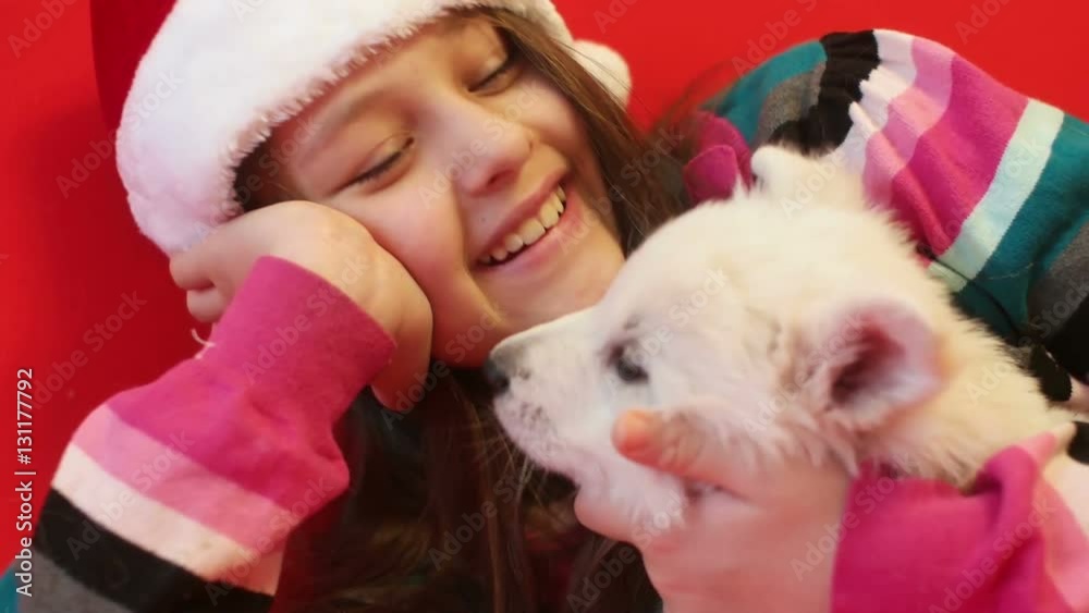 kid and white puppy , slow motion kid and white puppy , slow motion