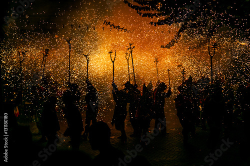 Group of people at Correfoc firerun, Catalonia, Spain photo