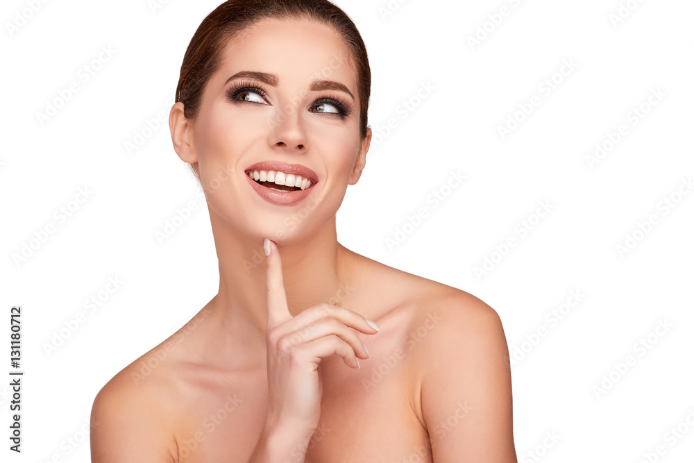 Beautiful woman face close up studio on white Beautiful woman face close up studio on white