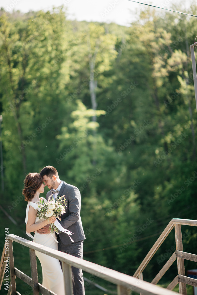 wedding couple hugging outdoors wedding couple hugging outdoors
