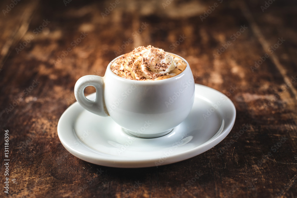 Cup of coffee with ice cream and chocolate on wooden background Cup of coffee with ice cream and chocolate on wooden background