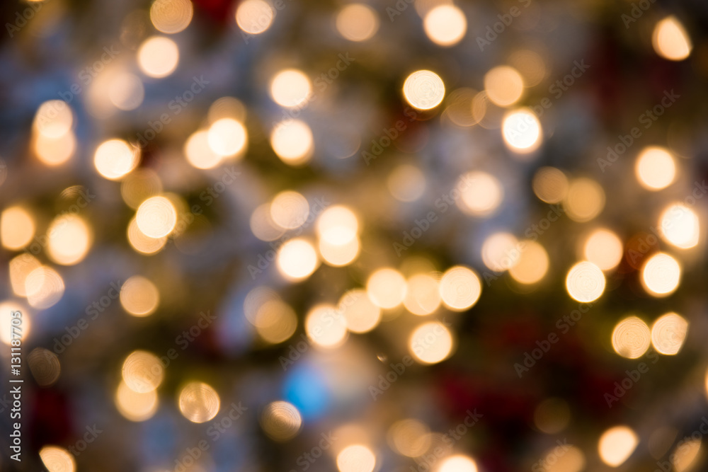 Festive New-year background with bokeh from Christmas tree lights glowing. Blurred colorful circles on light holiday Festive New-year background with bokeh from Christmas tree lights glowing. Blurred colorful circles on light holiday
