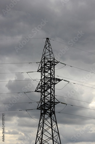 reliance power lines against a stormy sky
