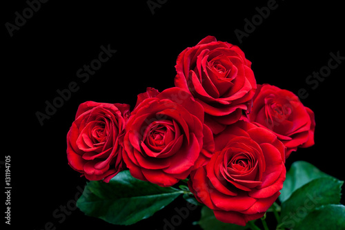 Bouquet of beautiful red roses on black background  Floral wallpaper